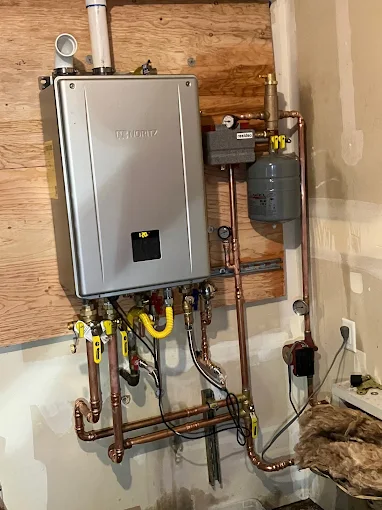 Tankless water heater install with copper pipework and expansion tank