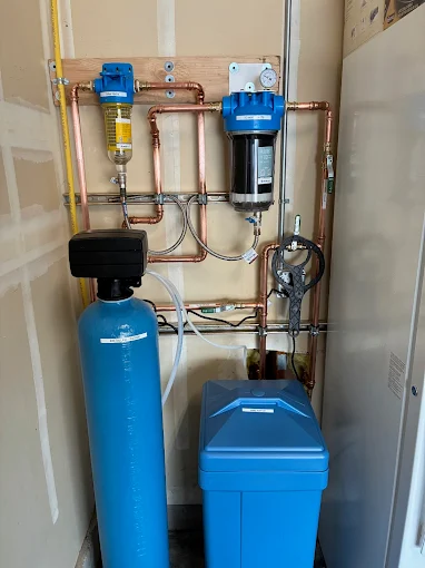 Water treatment system with softener, brine tank and Atlas Hydra filter